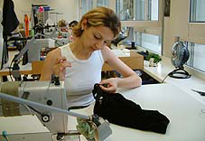 Textil- und Modenäher/in